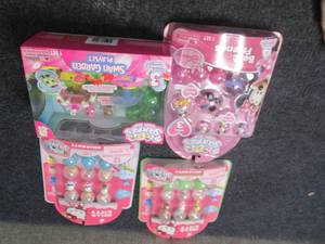 4 Squinkies Toys...