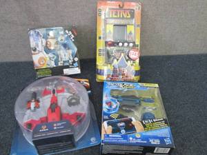 4 Assorted Toys...