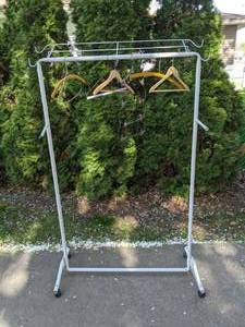 lot 139 image: Rolling Clothing Rack w Hangers