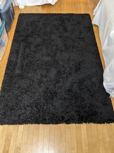 lot 114 image: 54 x 79 Black Shag Rug