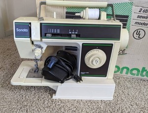 lot 124 image: Singer Sonata 2 Stitch Sewing Machine Model no. 6602