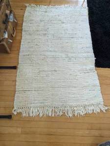 lot 105 image: 36 x 64 Braided Fringe Rug