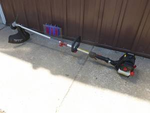 lot 12 image: Craftsman 4 cycle weed trimmer. Nearly new. Tested & works. As shown.