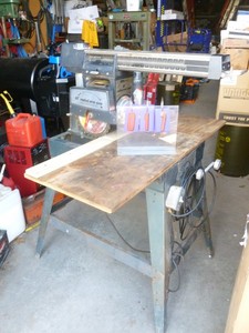 lot 17 image: Montgomery Wards radial arm saw. Tested & works. As shown.