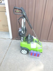 lot 22 image: Greenworx 1700 psi electric pressure washer with hose & wand. Powers up but unable to fully test. As shown.