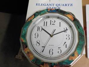 Elegant Quartz 11 Clock needs bat...