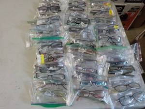 50 eyeglass frames brands on glass...