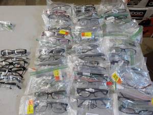 50 eyeglass frames brands on glass...