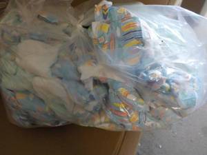 Bag of 100 or so Diapers Newborn-3 ...