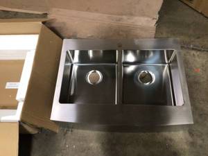 lot 30 image: CMI Brimley Retrofit Dual Mount Stainless Steel 33 in. 1-Hole 5050 Double Bowl Curved Farmhouse Apron Front Kitchen Sink Not used see pictures