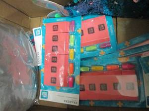 box of erasers, pencil pouches and ...