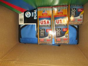 box of folders and pencils ...