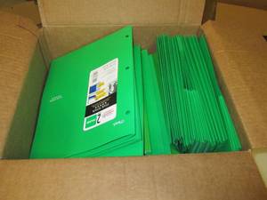 box of 3 ring binders and green fol...