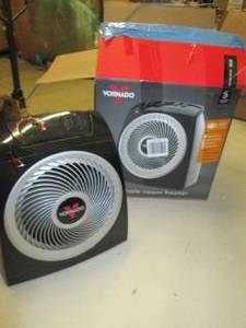 vornado whole room heater powers on...