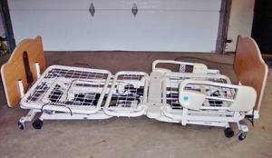 lot 9 image: MSRP $3500 JOERNS ULTRA CARE BED MULTI POSITIONAL HI &amp VERY LOW LONG TERM PATIENT CARE ADJUSTABLE BED WHAND REMOTE...INCLUDES FREE HIGH QUALITY (RESISTS BED SORES) MATTRESS EXCELLENT WORKING CONDITION