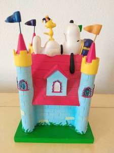 lot 133 image: A Dogs House Is His Castle Snoopy Figurine