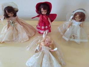 lot 136 image: Four Storybook Dolls