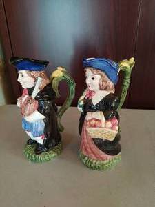 lot 17 image: Fitz and Floyd- Pilgrim Man and Woman Pitcher Set