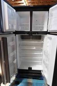 lot 43 image: RM1350MX Dometic 4 Door GasElec Refer- Works