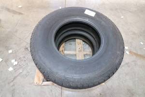 lot 105 image: (2) Trailer Tires 23585R16