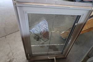 lot 128 image: 28x36 Tan dual Pane Window Crank Open