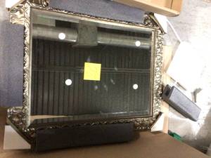 Silver 24 in. W x 30 in. H Framed Rectangular Beveled Edge Bathroom Vanity Mirror in Silver&nbsp&nbspCustomer Returns See Pictures&nbsp