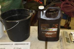 lot 577 image: Fiebings Prime Neatsfoot Oil Compound 1-Gallon Plastic Jug (34-full)
