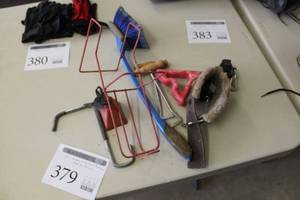 lot 379 image: Lot of Equine Accessories  with Boot Pulls, Cuff, Mineral Block Holder, Brush, Bell, Stall Hook