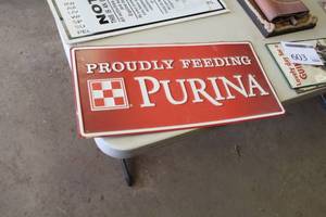 lot 601 image: Purina Metal Sign 24Wx12H
