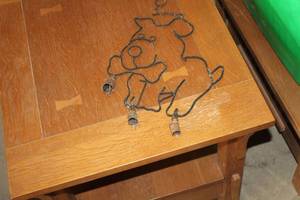 lot 717 image: Metal Dog with Bone Wind Chime 12H
