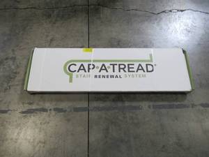 lot 508 image: Cap A Tread Java Scraped Oak 47 in. Length x 12-18 in. Deep x 1-1116 in. Height Laminate to Cover Stairs 1 in. Thick 016074570