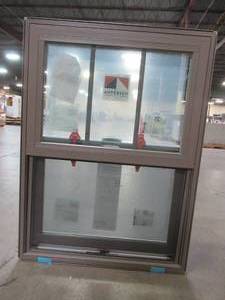 lot 634 image: Andersen 100 Series Vinyl Single Hung Window, Measures Approximately 27 12 x 3 14 x 37 12 Tall.