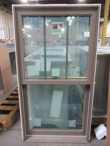 lot 638 image: Andersen Windows Colonial Vinyl Double Hung Window, Measures Approximately 29 12 x 3 x 53 12 Tall.