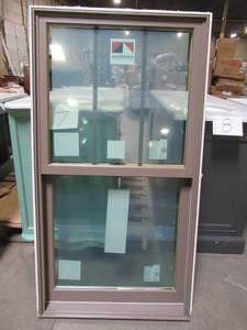 lot 639 image: Andersen Windows Colonial Vinyl Double Hung Window, Measures Approximately 29 12 x 3 x 53 12 Tall.