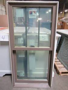 lot 645 image: Andersen Windows Colonial Vinyl Double Hung Window, Measures Approximately 27 12 x 3 x 53 12 Tall.
