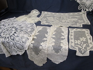 Hand crocheted doilies, chair back ...