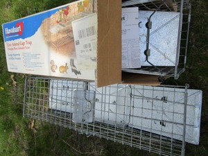 Live traps one new in box, 24x7x...