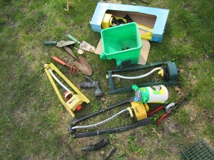 Sprinklers with new garden tools, b...