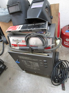 Powr-Kraft 230 welder, two helmets,...
