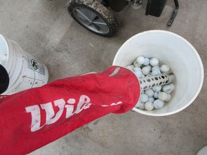 Golf balls - 50, Wilson ball grabb...
