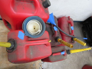 Plastic gas cans, qty 5, a couple h...