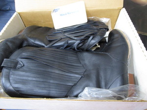Black western boots with fringe lad...