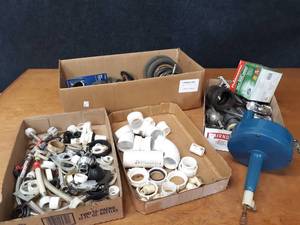 Large Lot of Caster Wheels and Plumbing Supplies