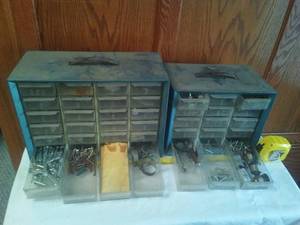 2 metal parts bins with contents.