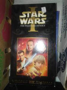 VHS tapes, DVDs, playing cards.
