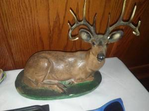 Jewelry, deer statue & eyeglasses.