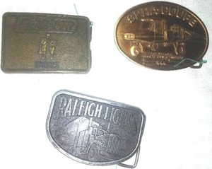 3 belt buckles - Horton, Melroe, Raleigh Lights.