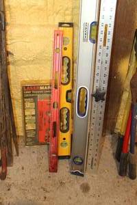 lot 805 image: Lot of (5) Hand Tools  - LaserMark Laser Torpedo Level (new), 4 Level, 2 Level (x2), T-Square