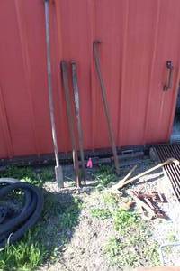lot 793 image: Lot of (Approximately 8) Farm Tools  - Heavy Duty Pry Bars, Hay Hooks, Chopper