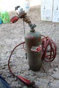 lot 853 image: Small Acetylene Torch Tank  with Prest-O-Lite Torch Head, Valve, Regulator and Hose